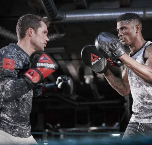 Боксерські рукавиці Reebok Combat Leather Boxing Gloves чорний, червоний 10 унцій (RSCB-10110RD-10)